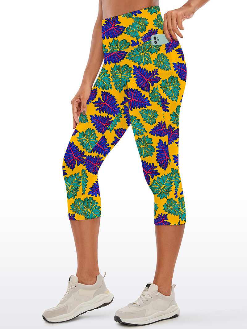 Botanical purple and green tropical leaves capris