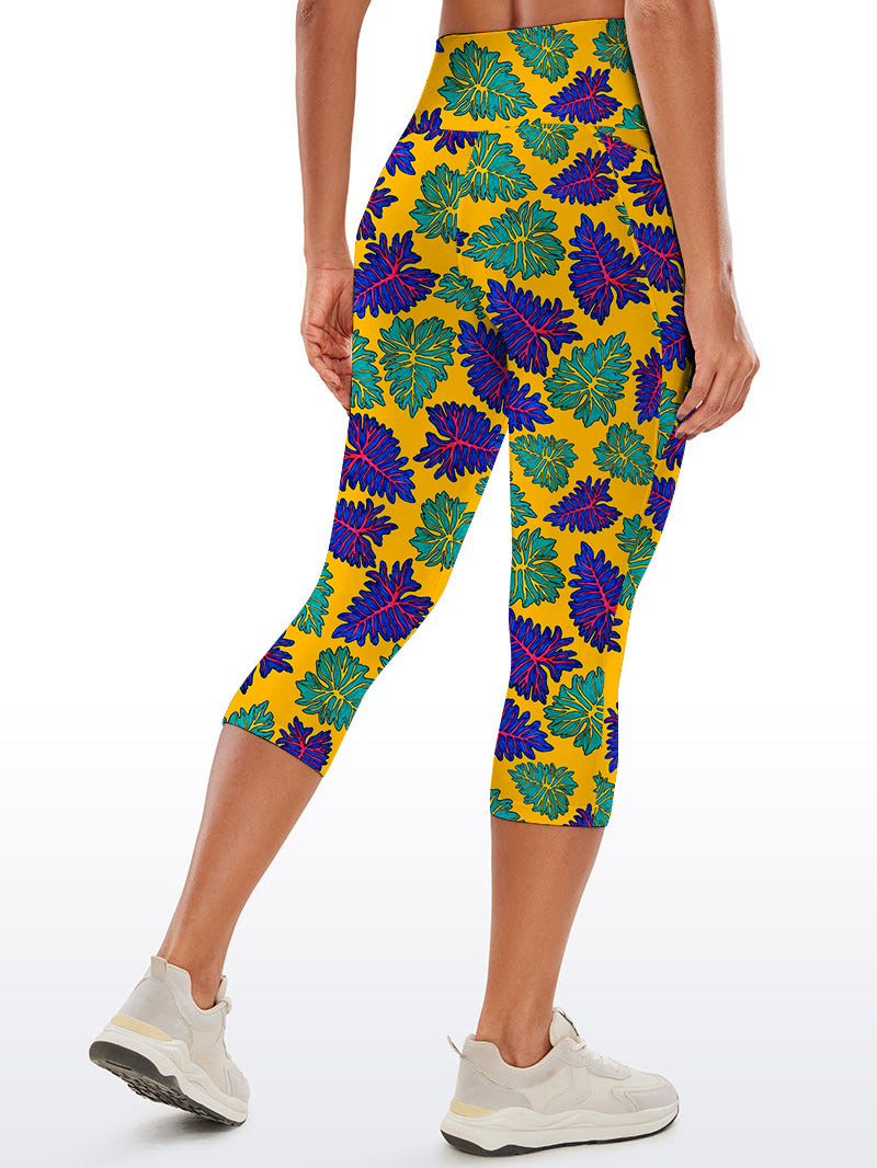Botanical purple and green tropical leaves capris