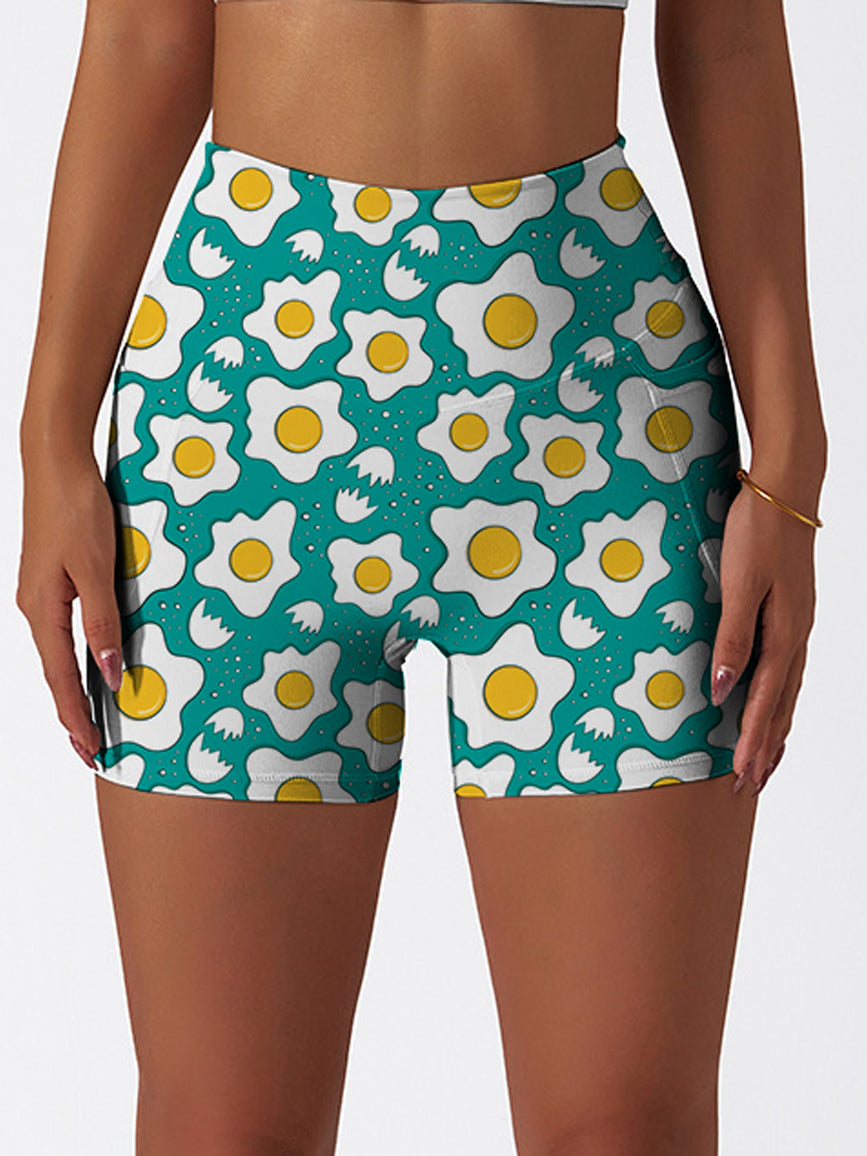 Cartoon fried eggs pattern pastel blue shorts
