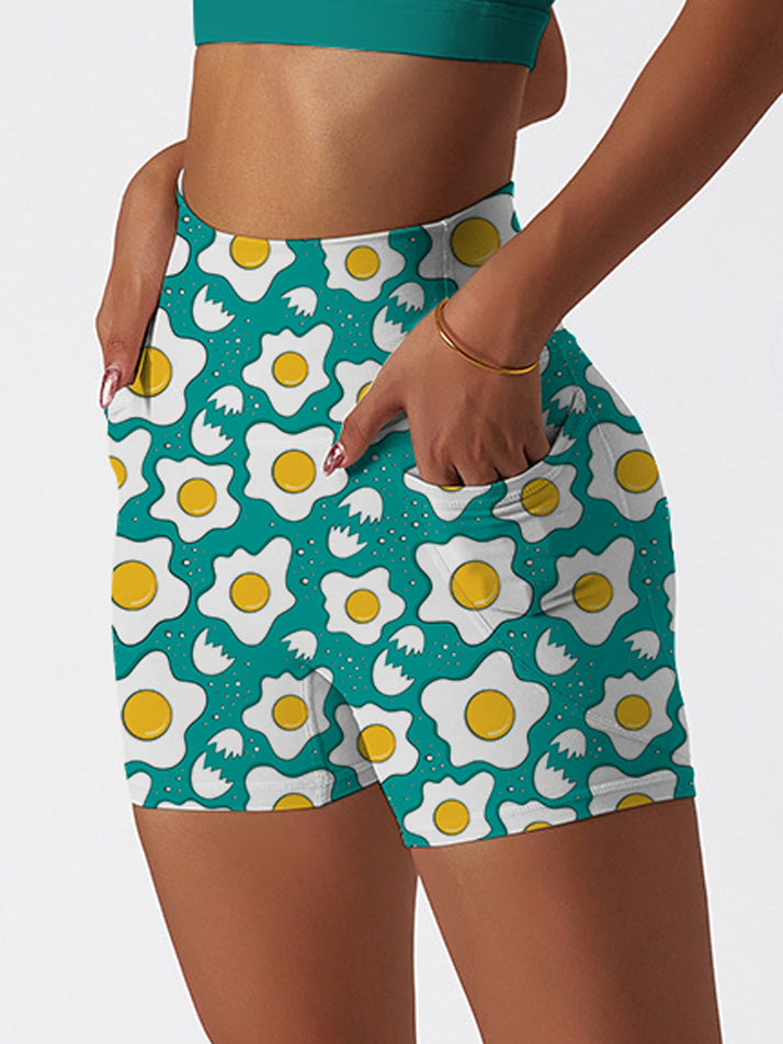 Cartoon fried eggs pattern pastel blue shorts
