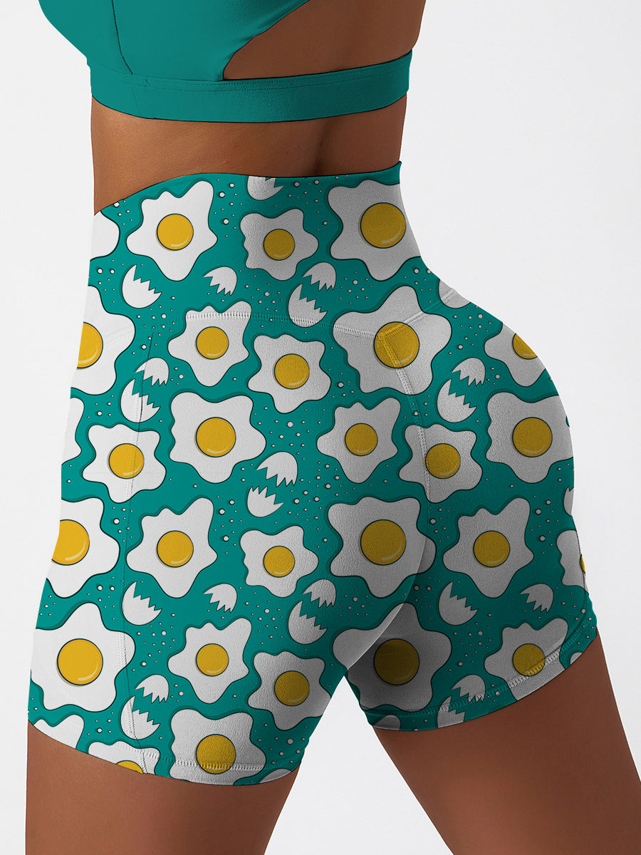 Cartoon fried eggs pattern pastel blue shorts