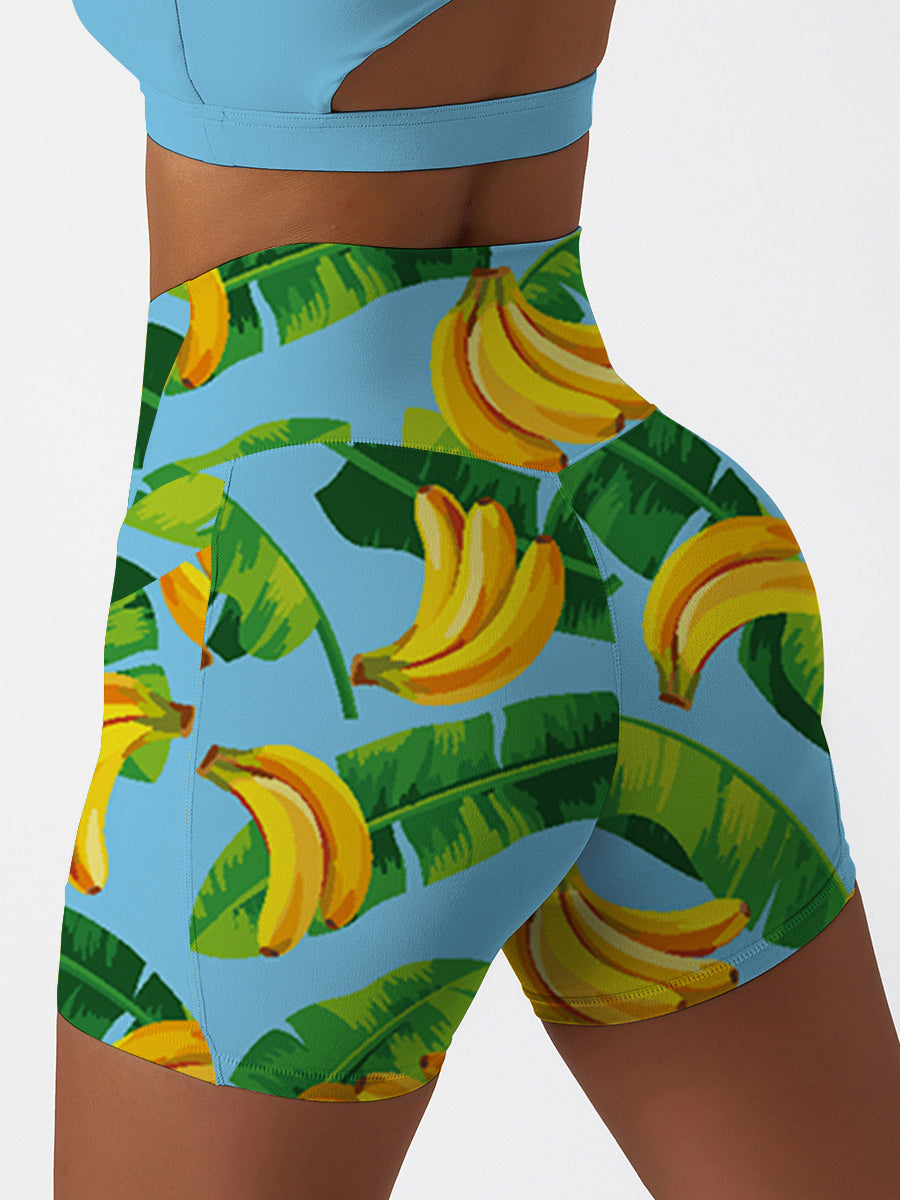 Fruits exotic palm leaves sweet yellow banana shorts