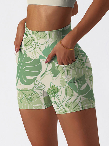 Botanical monstera leaves hand painted green shorts
