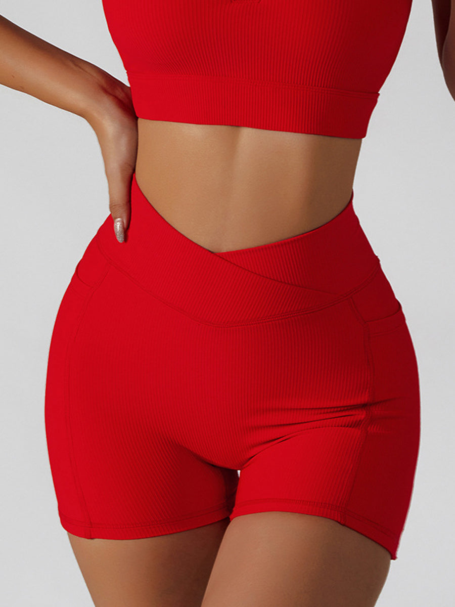 Basic crossover hip lift side pocket track yoga shorts
