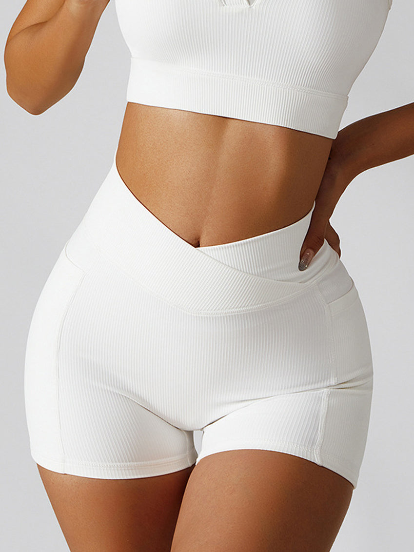Basic crossover hip lift side pocket track yoga shorts