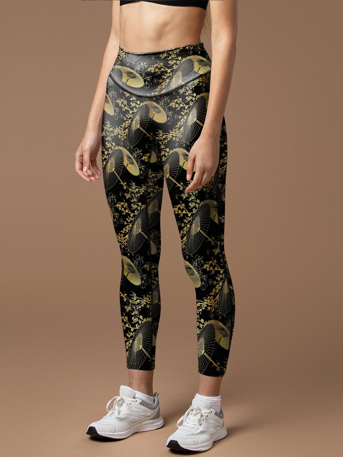 Deaturing gold umbrella outlined in gold leggings