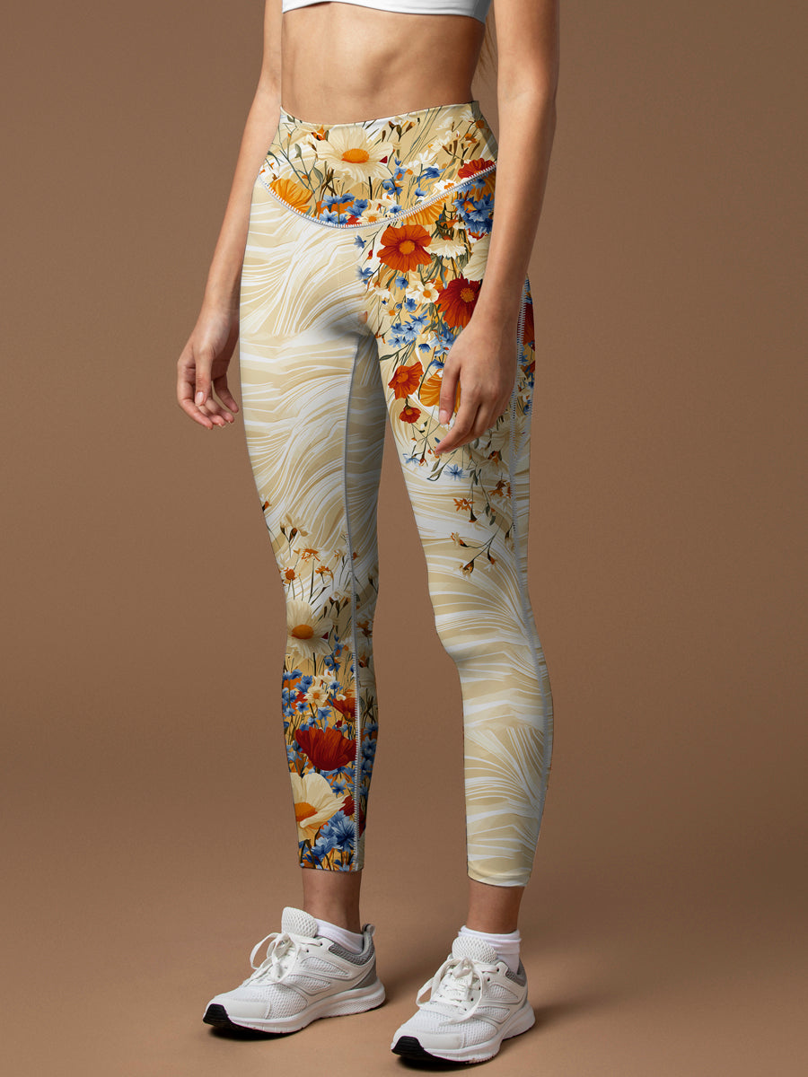 Vibrant wildflowers on creamy swirl leggings