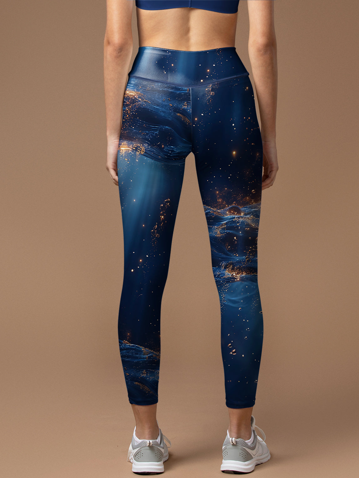 Gold shining through the sea surface water ripple leggings