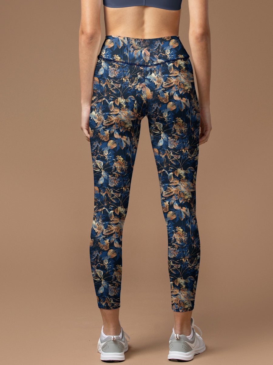 Botanical golden withered leaves decorative blue leggings