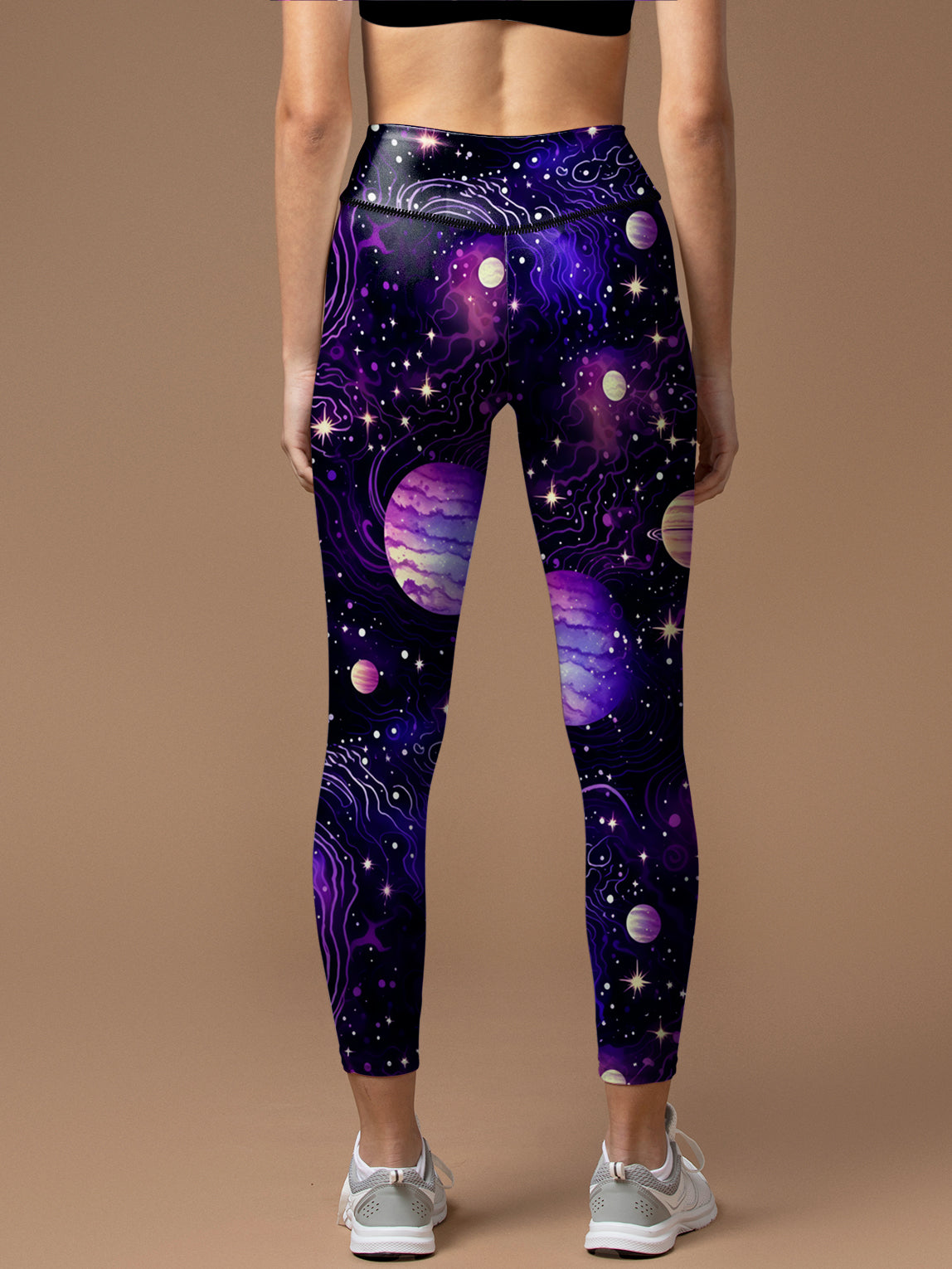 Purple planet with stars in the universe leggings
