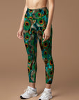 Animal green peacock feather leggings